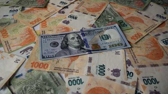 Argentina devalues peso after shock primary election result
