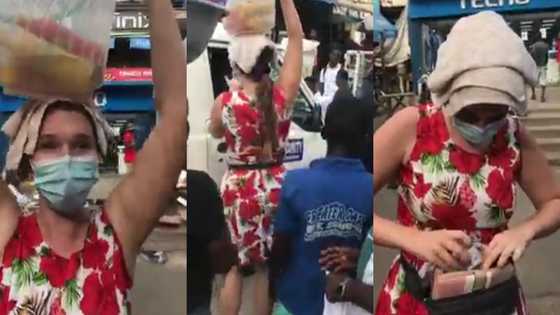 Krom ayeshi: Video of German lady hawking drinks on the street of Accra pops up
