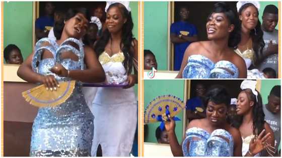 Ghanaian bride looked fabulous in a lace gown that prevents her husband from hugging her in public