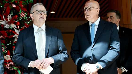 Australians vote in election swayed by inflation, Trump