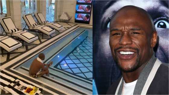 Money man: Floyd Mayweather flaunts his GHC64m mansion; shows swimming pool with TV in new video