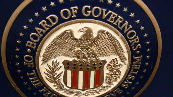 Gold hits record, stocks slip as Trump fuels Fed fears