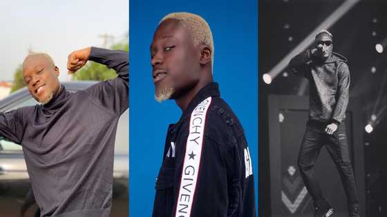 Okese1 spotted in video throwing wads of cash on the street