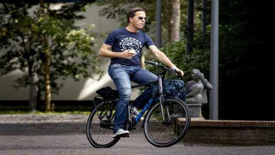 Bike-loving Rutte rides to record term as Dutch PM