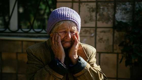 Divided loyalties in Ukraine city as Russia presses assault