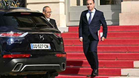 France risks credit downgrade as new PM tackles budget