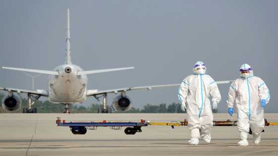 Asian markets up after China ends travel quarantine