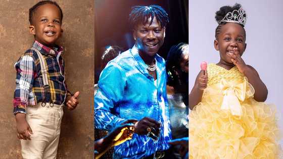 Father goal: Stonebwoy makes his children laugh as he plays with them; flaunts his plush living room in new video