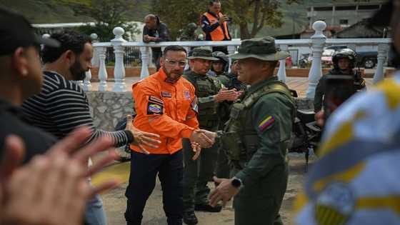 Dogs, drones and a happy ending for Venezuela's rescued 'fanatics'