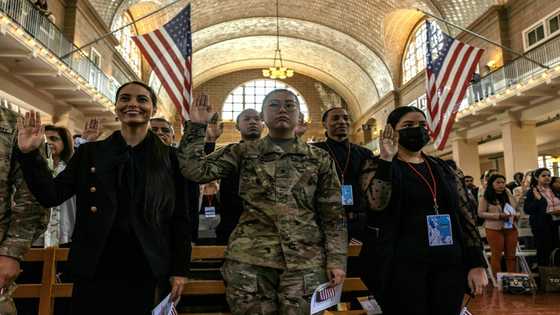 'I belong here': New US citizens take oath on Ellis Island