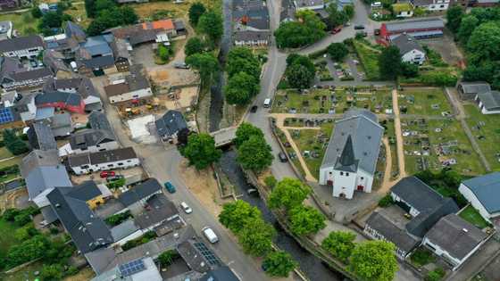 Flood anniversary prompts sadness and soul-searching in Germany