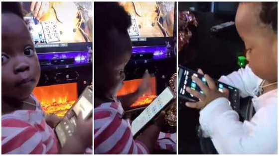 Reactions as little kid looks for Wizkid's song essence on adult's phone herself, plays it in viral video