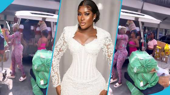Fella Makafui wheels cart around Kumasi City Mall, joins workers to offload good ahead of sale event