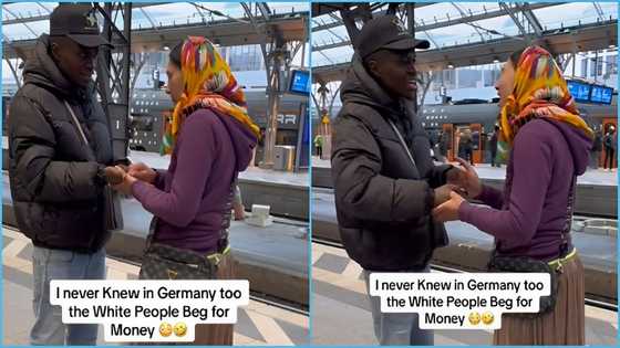 White woman begs Ghanaian man for money on the streets of Germany