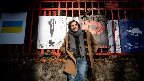 'My Kalashnikov is my pen': Ukraine artist wages war on Putin