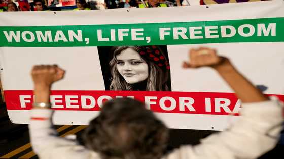 Iranians defy crackdown as another teen reported killed