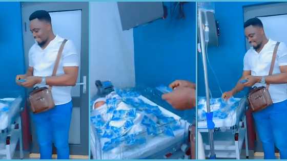 Ghanaian dad sprays cash to welcome new baby into the world: “Secure the DNA test first”