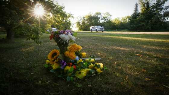 Search for Canada stabbing suspect widens as community mourns