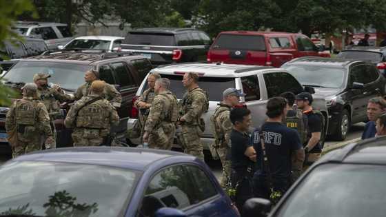 Police arrest suspect after gunman kills six at US July 4 parade