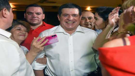 The United States on Friday slapped a travel ban on Paraguay's former president Horacio Cartes, accusing the businessman turned politician of corruption and links to "terrorist" groups.