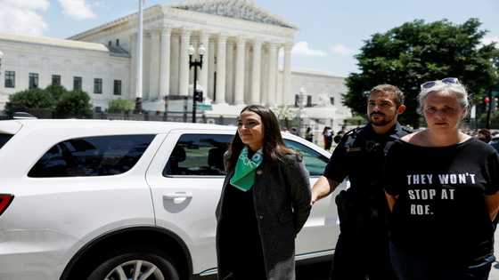 At least 17 Democratic lawmakers, including Alexandria Ocasio-Cortez of New York and Ilhan Omar of Minnesota, were arrested at an abortion rights rally outside Conress in Washington, DC, on Tuesday, police said.