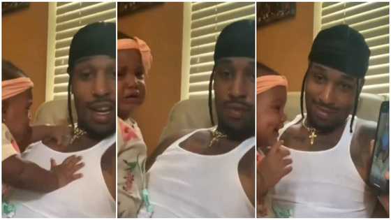 Video Shows moment baby stops crying and bursts into laughter after watching a clip of herself