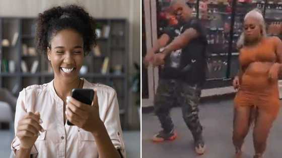 Young man & gorgeous lady show off fire dance moves; many don't even notice the man