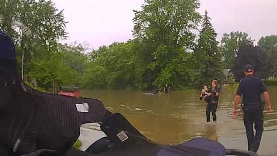 Heroic Police Officers Hailed for Rescuing 82-Year-Old Woman from Flood Waters