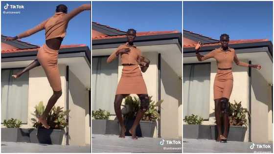 Pretty dark-skinned lady 'taller than house' dances in video, her height shakes many online