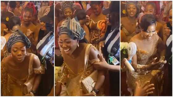 Video shows surprising moment female security guard dragged dancing lady away from bride at wedding