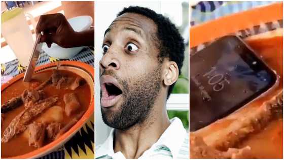 Why did he do that? Video of man dipping iPhone into fufu and soup with assorted meat and fish causes stir