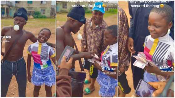 "No fit buy bag sef": Girl sees Portable for first time, he dips hands into bag, gives her wad of money