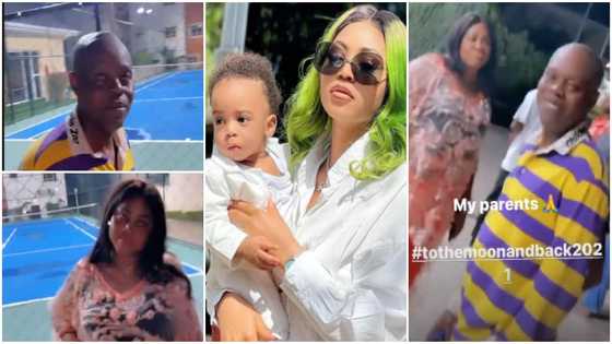 Regina Daniels proudly shows off her parents as they come together to celebrate her son's first birthday