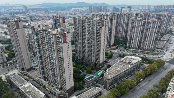 Asian stocks mixed after Wall St record, eyes on Evergrande impact