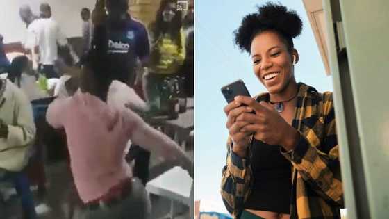 A woman shows mad skills as she dances with beer bottle on head; many are impressed