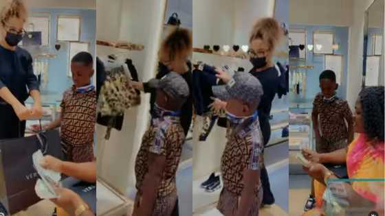 Cash mama: Tracey Boakye takes son on Versace shopping spree in Dubai; celebs react