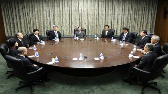 Bank of Japan to review, but maintain, easing measures