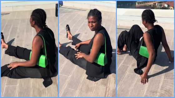 Ghanaian lady gets on rooftop of high rise building to appreciate beauty of Accra, crawls to get down