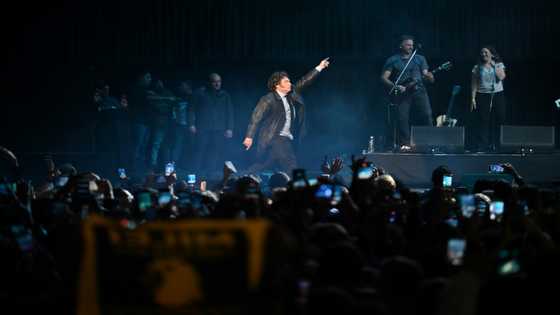 Argentina's Milei sings hard rock at book launch