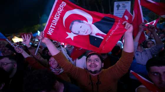Erdogan confronts polarised Turkey after historic win