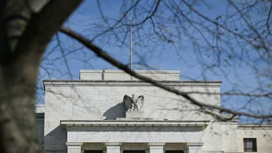 Asian markets mixed after Fed official floats rate cut delay