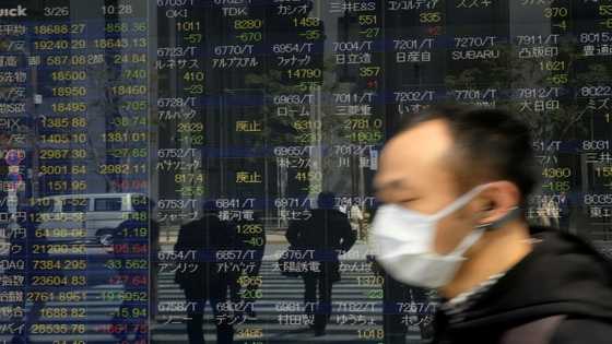 Asian markets struggle as traders contemplate more rate hikes