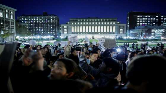 Biden monitoring China Covid unrest as US rallies pop up