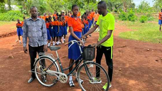 Poor GH girl who walks for 2 hours to school and home gets new bike; photo, videos stir emotions