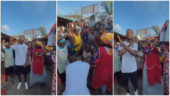 Mr Eazi storms Makola Market with fire dance moves, Market women cheer him on massively, videos drops