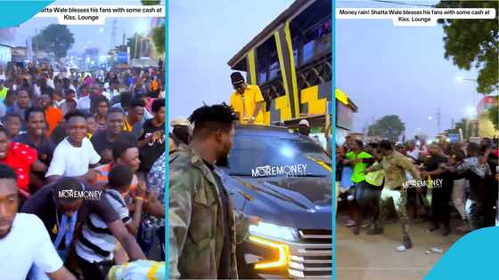 Shatta Wale causes chaos in town as he sprays 5 cedi notes into large crowd