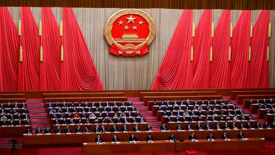 China retains central bank chief in unexpected move