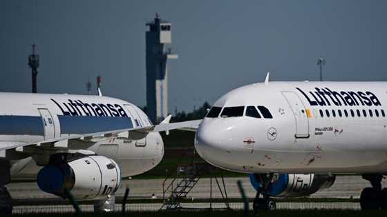 Lufthansa reports loss, cuts outlook after strikes