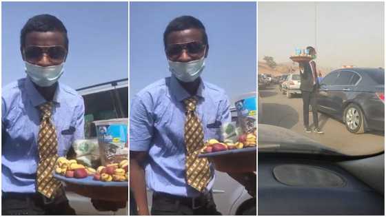 Young man with suit and tie hawks kola nuts, sweets in traffic; his video goes viral