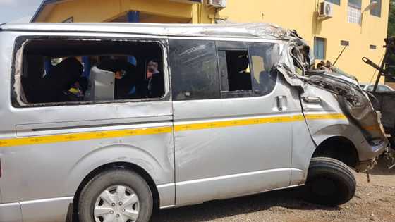 Trotro driver risks lives of over 10 passengers to knock down 2 robbers; vehicle somersaults